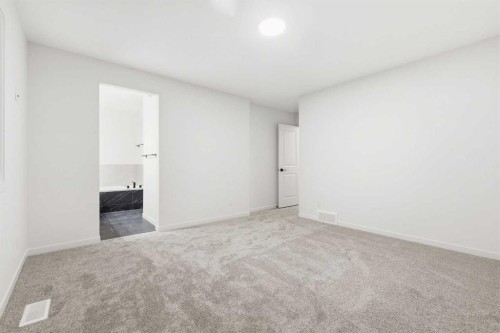 48 Herron Way Ne, Calgary, AB - Indoor Photo Showing Other Room