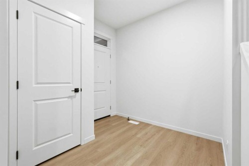 48 Herron Way Ne, Calgary, AB - Indoor Photo Showing Other Room