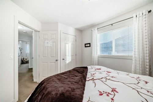 198 Brightonstone Bay Se, Calgary, AB - Indoor Photo Showing Bedroom