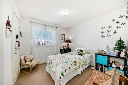 198 Brightonstone Bay Se, Calgary, AB - Indoor Photo Showing Bedroom
