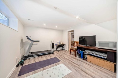 198 Brightonstone Bay Se, Calgary, AB - Indoor Photo Showing Gym Room