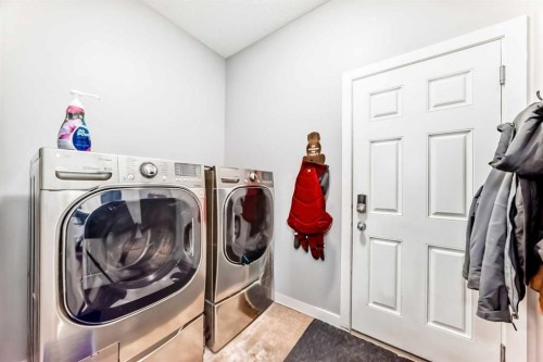 562 New Brighton Drive Se, Calgary, AB - Indoor Photo Showing Laundry Room