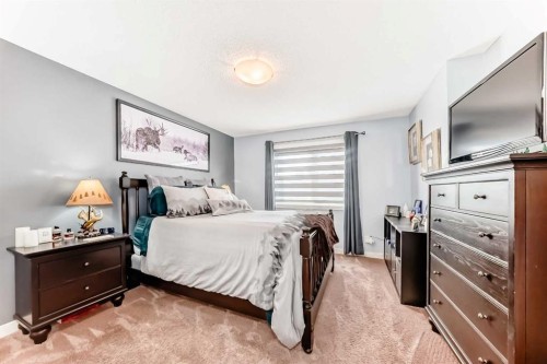 562 New Brighton Drive Se, Calgary, AB - Indoor Photo Showing Bedroom