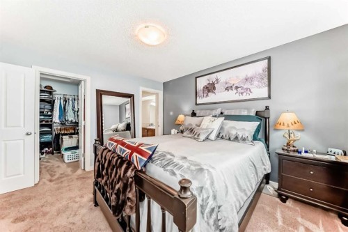 562 New Brighton Drive Se, Calgary, AB - Indoor Photo Showing Bedroom