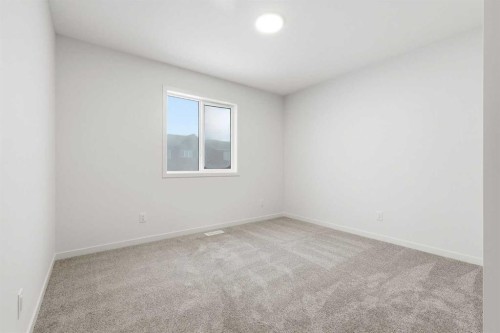 72 Calhoun Rise Ne, Calgary, AB - Indoor Photo Showing Other Room
