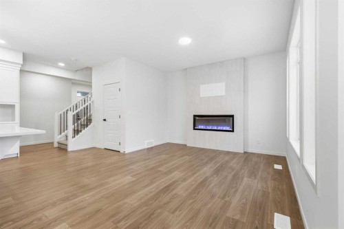 72 Calhoun Rise Ne, Calgary, AB - Indoor With Fireplace