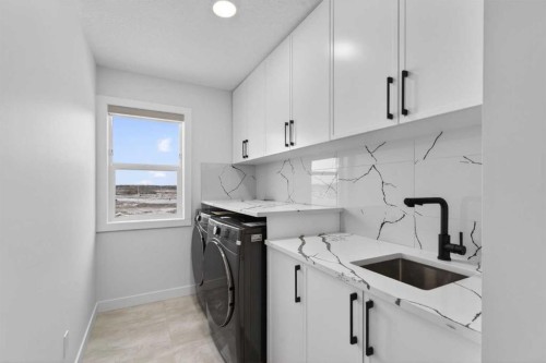 67 Lakes Estates Circle, Strathmore, AB - Indoor Photo Showing Laundry Room
