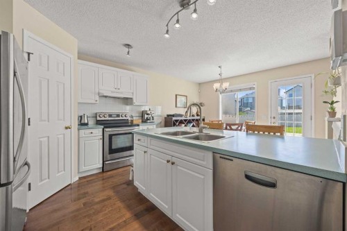71 Somercrest Close Sw, Calgary, AB - Indoor Photo Showing Kitchen With Stainless Steel Kitchen With Double Sink