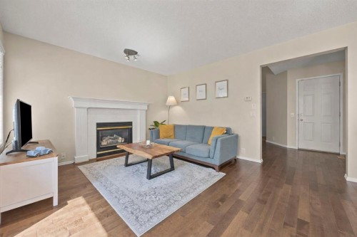 71 Somercrest Close Sw, Calgary, AB - Indoor Photo Showing Living Room With Fireplace