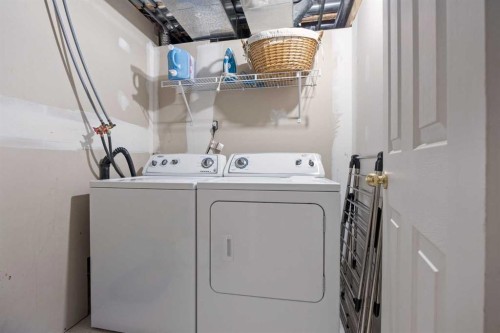 71 Somercrest Close Sw, Calgary, AB - Indoor Photo Showing Laundry Room