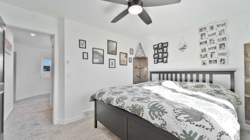 148 Covepark Close Ne, Calgary, AB - Indoor Photo Showing Bedroom