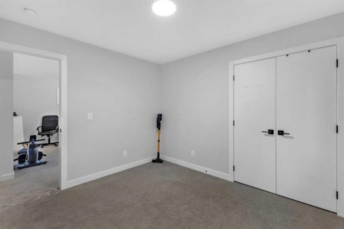 14 Carrington Road Nw, Calgary, AB - Indoor Photo Showing Other Room