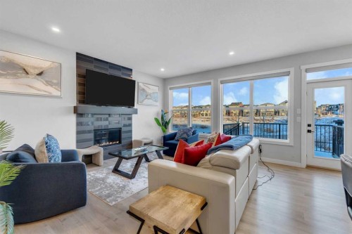 14 Carrington Road Nw, Calgary, AB - Indoor Photo Showing Living Room With Fireplace
