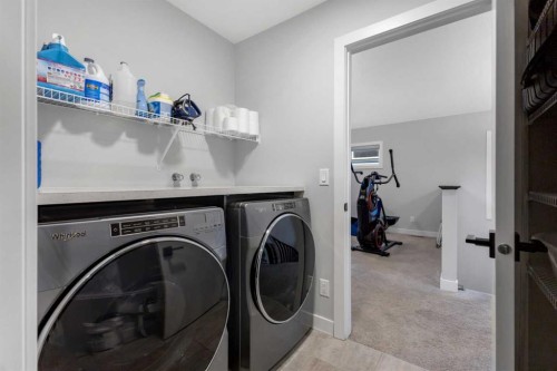 14 Carrington Road Nw, Calgary, AB - Indoor Photo Showing Laundry Room