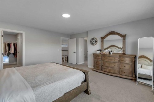 14 Carrington Road Nw, Calgary, AB - Indoor Photo Showing Bedroom