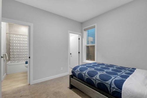 14 Carrington Road Nw, Calgary, AB - Indoor Photo Showing Bedroom