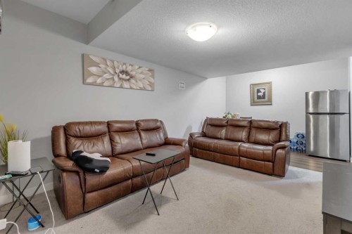 14 Carrington Road Nw, Calgary, AB - Indoor Photo Showing Living Room