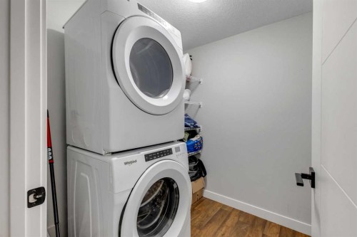 14 Carrington Road Nw, Calgary, AB - Indoor Photo Showing Laundry Room