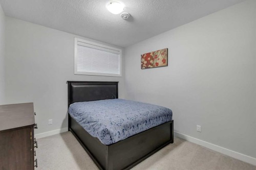 14 Carrington Road Nw, Calgary, AB - Indoor Photo Showing Bedroom