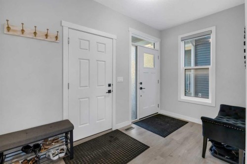 14 Carrington Road Nw, Calgary, AB - Indoor Photo Showing Other Room
