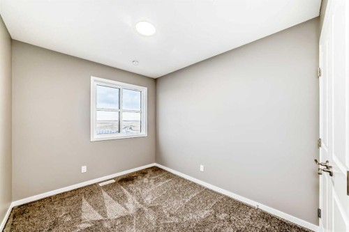 131 Sawgrass Gate Nw, Airdrie, AB - Indoor Photo Showing Other Room