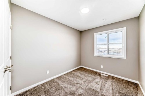 131 Sawgrass Gate Nw, Airdrie, AB - Indoor Photo Showing Other Room