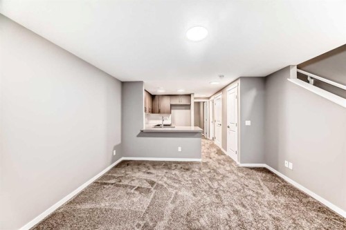 131 Sawgrass Gate Nw, Airdrie, AB - Indoor Photo Showing Other Room