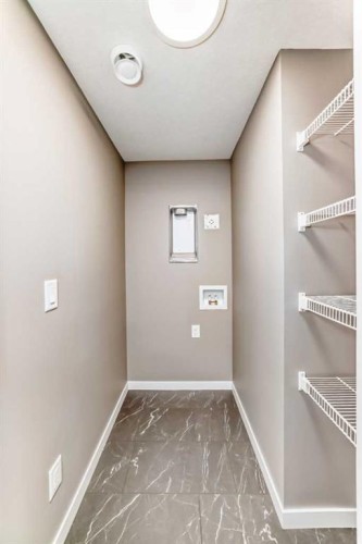 131 Sawgrass Gate Nw, Airdrie, AB - Indoor Photo Showing Other Room