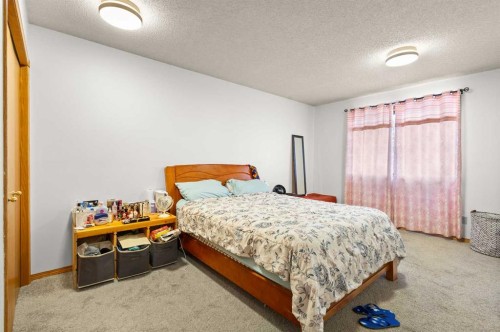 132 Scenic Cove Circle Nw, Calgary, AB - Indoor Photo Showing Bedroom