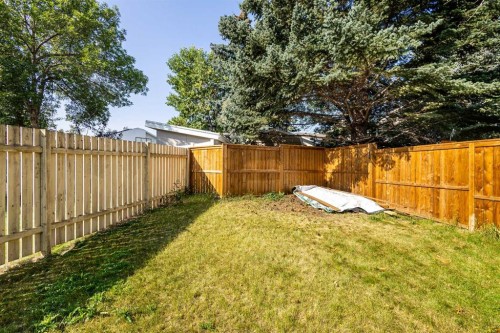 132 Scenic Cove Circle Nw, Calgary, AB - Outdoor With Backyard