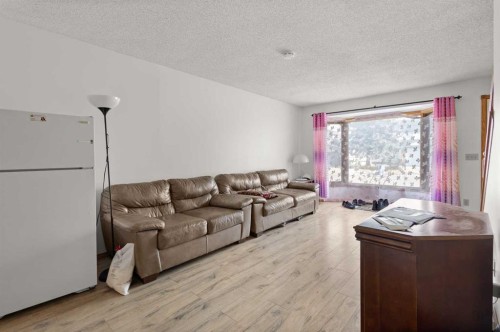 132 Scenic Cove Circle Nw, Calgary, AB - Indoor Photo Showing Living Room