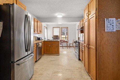 132 Scenic Cove Circle Nw, Calgary, AB - Indoor Photo Showing Kitchen With Double Sink