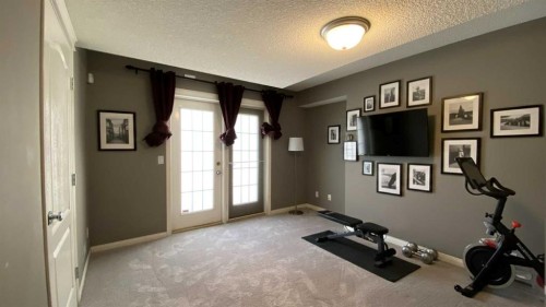 179 Sierra Morena Landing Sw, Calgary, AB - Indoor Photo Showing Gym Room