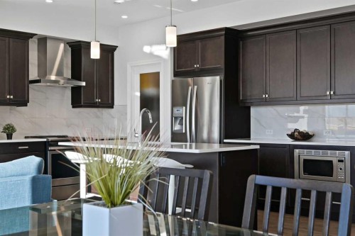 126 Howse Common Ne, Calgary, AB - Indoor Photo Showing Kitchen With Stainless Steel Kitchen With Upgraded Kitchen