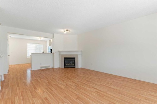 119 Royal Birch Villas Nw, Calgary, AB - Indoor Photo Showing Living Room With Fireplace