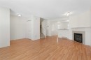 119 Royal Birch Villas Nw, Calgary, AB  - Indoor Photo Showing Living Room With Fireplace 