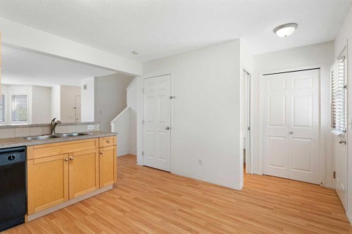 119 Royal Birch Villas Nw, Calgary, AB - Indoor Photo Showing Kitchen With Double Sink