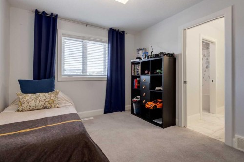 37 Cattail Run, Rural Rocky View County, AB - Indoor Photo Showing Bedroom