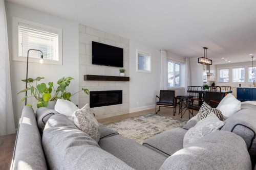37 Cattail Run, Rural Rocky View County, AB - Indoor Photo Showing Living Room With Fireplace