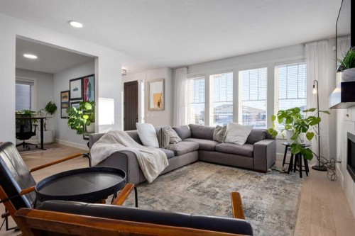 37 Cattail Run, Rural Rocky View County, AB - Indoor Photo Showing Living Room With Fireplace