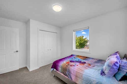 80 Canoe Square Sw, Airdrie, AB - Indoor Photo Showing Bedroom