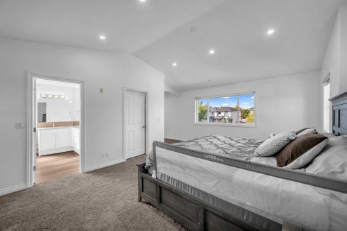 80 Canoe Square Sw, Airdrie, AB - Indoor Photo Showing Bedroom