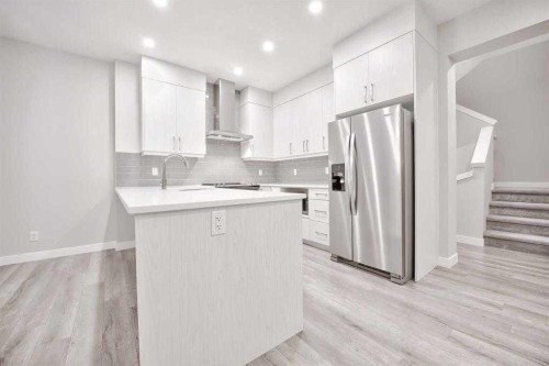 917 Crestridge Common Sw, Calgary, AB - Indoor Photo Showing Kitchen With Stainless Steel Kitchen