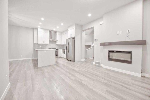 917 Crestridge Common Sw, Calgary, AB - Indoor With Fireplace