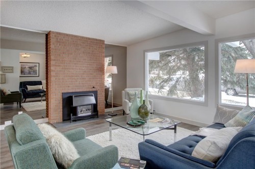 10212 7 Street Sw, Calgary, AB - Indoor Photo Showing Living Room With Fireplace