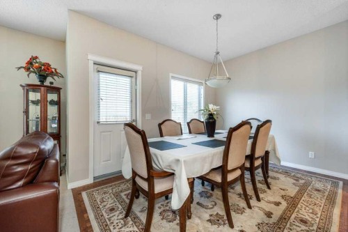 1119 Panamount Boulevard Nw, Calgary, AB - Indoor Photo Showing Dining Room