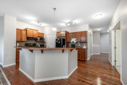 1119 Panamount Boulevard Nw, Calgary, AB - Indoor Photo Showing Kitchen
