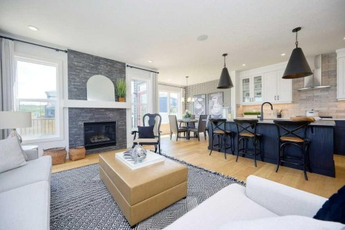 103 Wolf Creek Rise Se, Calgary, AB - Indoor Photo Showing Living Room With Fireplace