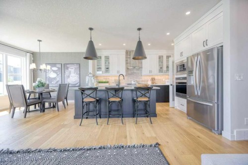 103 Wolf Creek Rise Se, Calgary, AB - Indoor Photo Showing Kitchen With Upgraded Kitchen