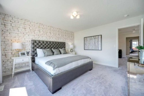 103 Wolf Creek Rise Se, Calgary, AB - Indoor Photo Showing Bedroom